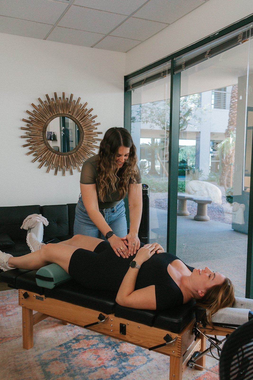 Dr. Paris performing the Webster Technique on a pregnant patient at Adjustology Holistic Family Chiropractic in North Scottsdale, Arizona.